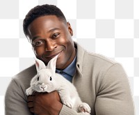 PNG  African american middle age man hugging rabbit portrait mammal animal. AI generated Image by rawpixel.