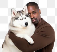 PNG  African american middle age man hugging siberian husky pet portrait mammal. AI generated Image by rawpixel.