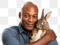 PNG  African american middle age man hugging rabbit portrait mammal animal. AI generated Image by rawpixel.