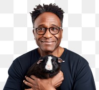 PNG  African american middle age man hugging guinea pig portrait glasses mammal. AI generated Image by rawpixel.