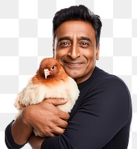 PNG  Indian middle age man hugging guinea pig portrait person adult. AI generated Image by rawpixel.