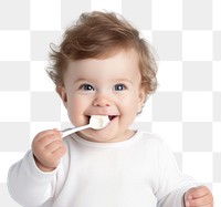 PNG  Baby enjoying with a spoon food toothbrush innocence. AI generated Image by rawpixel.