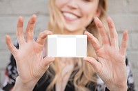 Cheerful woman showing her business card mockup transparent png