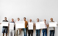 Diverse people holding blank posters mockup