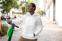 Menswear png hoodie mockup on a man with scooter