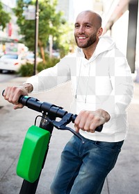 Menswear png hoodie mockup on a man with scooter