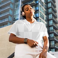 Png crop top mockup worn by a woman with headphones street style apparel
