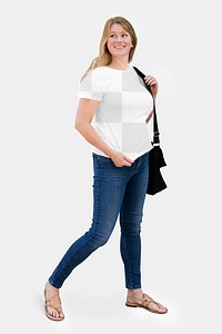 Png women&rsquo;s tee on woman walking in a studio