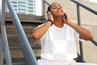 Png crop tee mockup worn by a woman with headphones street style apparel