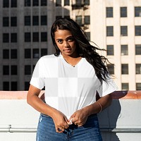 Png crop tee mockup worn by a woman on the rooftop
