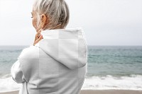 Png senior woman hoodie mockup winter beach apparel shoot