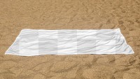 Png beach towel transparent mockup on the beach