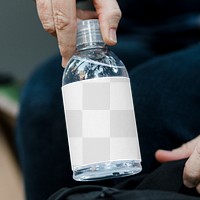 Png bottle mockup with senior hand holding it