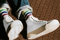 Png high top white sneakers mockup on model casual style