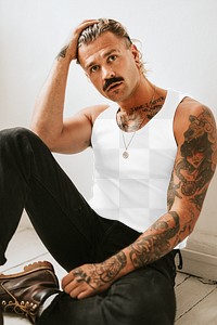 Tank top mockup png with black jeans on tattooed male model