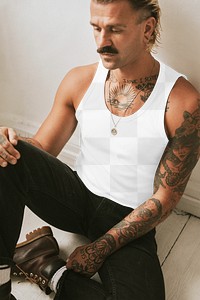 Tank top mockup png with black jeans on tattooed male model