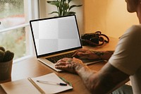 Laptop screen mockup png man working from home