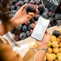 Phone png screen mockup, held by a woman doing grocery shopping