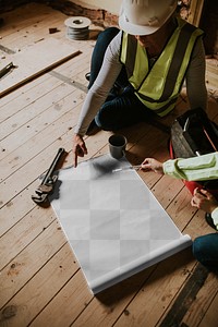 Paper png mockup at a construction site