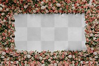 Sign mockup png on a flower wall installation with blank space
