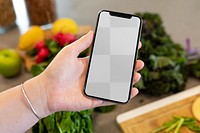 Mobile phone mockup png, transparent screen, in kitchen