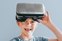 VR headset png mockup, boy playing game, entertainment technology