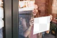 Sign png mockup, girl showing paper through glass window