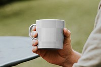 Mug png being held by a man 