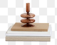 Modern brown transparent vase on a stack of books