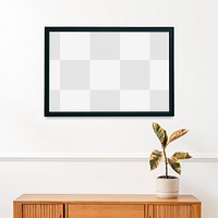 Picture frame mockup hanging above a wooden cabinet