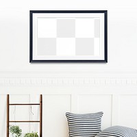 Black picture frame mockup hanging on a white wall