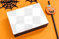 White letter board mockup on a Halloween decorated background 