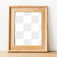 Brown wooden frame png mockup by a wall