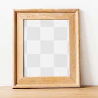 Wooden picture frame png mockup on wooden floor
