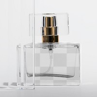 Png perfume bottle mockup with patterned glass texture product backdrop