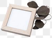 Wooden picture frame mockup png with aesthetic dried leaf