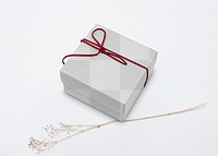 Kraft gift box mockup png with red bow rope in minimal style