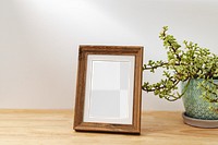 Png picture frame mockup on a table