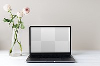 Transparent png, laptop screen mockup, minimal workspace, white flower decoration