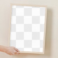 Picture frame mockup png, woman holding the wall art