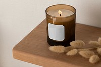 Candle mockup png on shelf, aromatic product packaging with transparent label