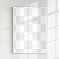 Blank frame on a wall with natural light