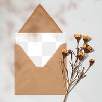 Blank card in a brown envelope with dried flowers