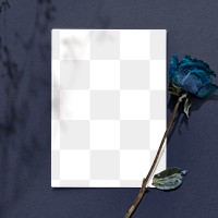 Blank card with dried blue rose on a blue background