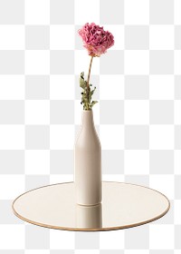 Dried pink peony flower in a beige vase on a shiny tray