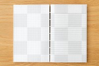 White grid and lined notebook mockup on a wooden table