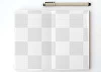 Blank plain white notebook page with a pen