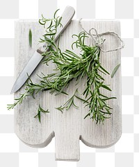 Png rosemary leaves on cut board flat lay