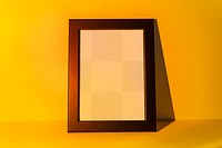 Picture frame png mockup with yellow sunset projector lamp
