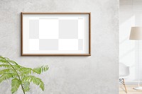 Wooden picture frame png mockup on the wall interior concept